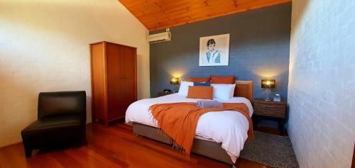 Ένα ή περισσότερα κρεβάτια σε δωμάτιο στο Great Escape Lofts