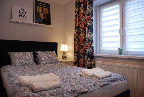 Ένα ή περισσότερα κρεβάτια σε δωμάτιο στο Apartment - Aloha 37m2 parter