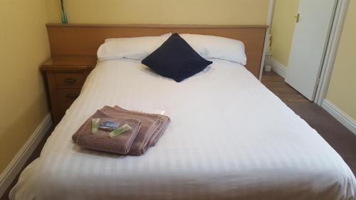 Ένα ή περισσότερα κρεβάτια σε δωμάτιο στο The Beacon Hotel