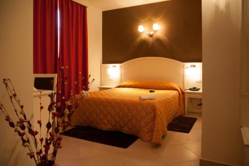 Cama o camas de una habitación en Hotel Centova