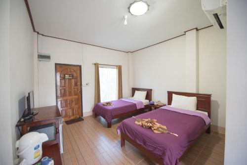 Een bed of bedden in een kamer bij Mountain View House
