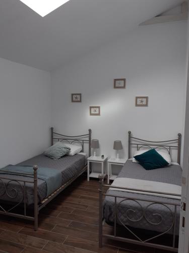 Giường trong phòng chung tại Gîtes Arvor et Tevenn