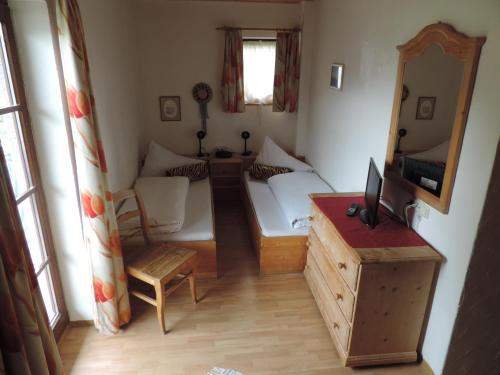 Ένα ή περισσότερα κρεβάτια σε δωμάτιο στο Gasthof Tauernalm