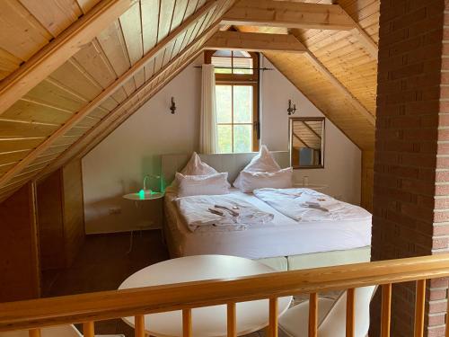 Una cama o camas en una habitación de Ferienhof am Trift