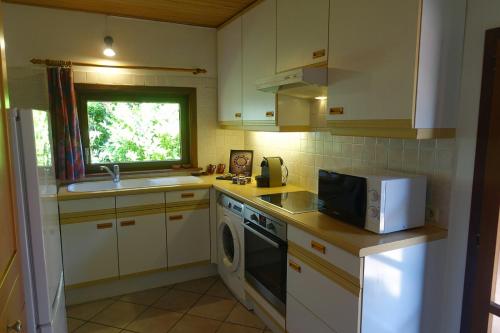 Η κουζίνα ή μικρή κουζίνα στο Lien's Cottage
