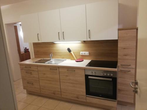 Kuchyň nebo kuchyňský kout v ubytování Ferienwohnung Maria