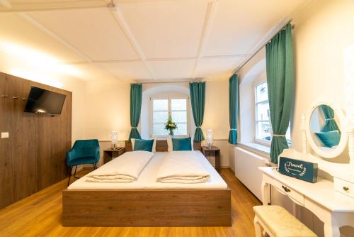 Postel nebo postele na pokoji v ubytování Urban Flair Hotel