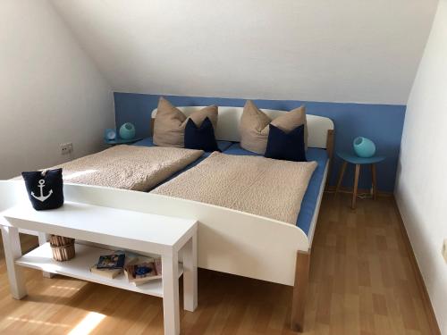 Ένα ή περισσότερα κρεβάτια σε δωμάτιο στο Ferienhaus "Strandgut"