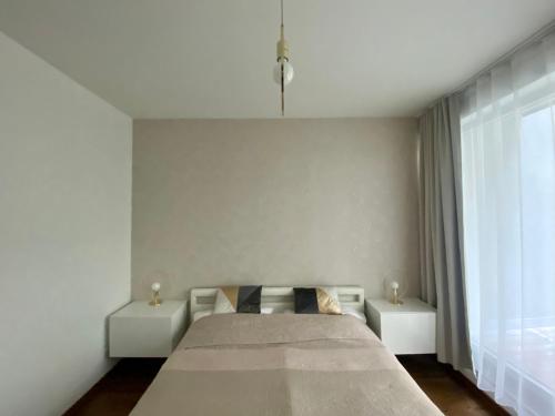 Postel nebo postele na pokoji v ubytování New residence apartments near Wenceslas Square