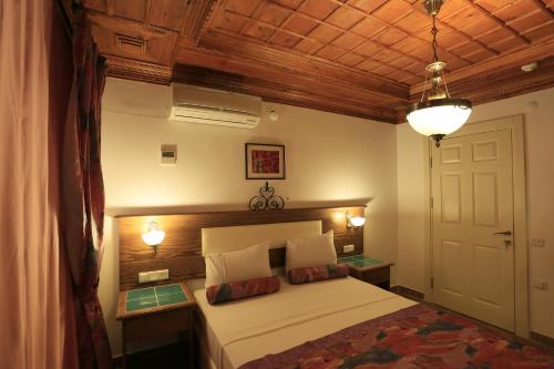 Cama o camas de una habitación en Kerme Ottoman Gokova