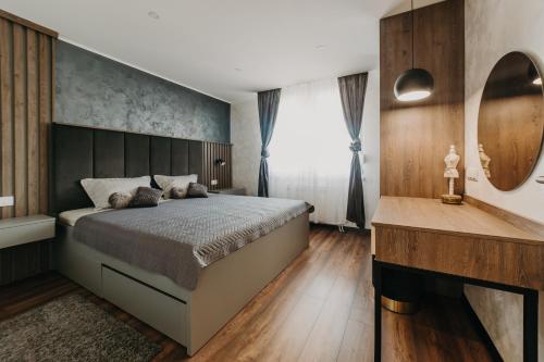 Llit o llits en una habitació de Apartman Stari Toranj
