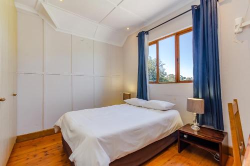 Ένα ή περισσότερα κρεβάτια σε δωμάτιο στο Kana guest farm - Spacious 8 Bedroom home for 15 guests