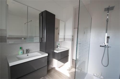 Ett badrum på Apartments Lantina