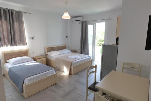Ένα ή περισσότερα κρεβάτια σε δωμάτιο στο Hotel Villa Adrian
