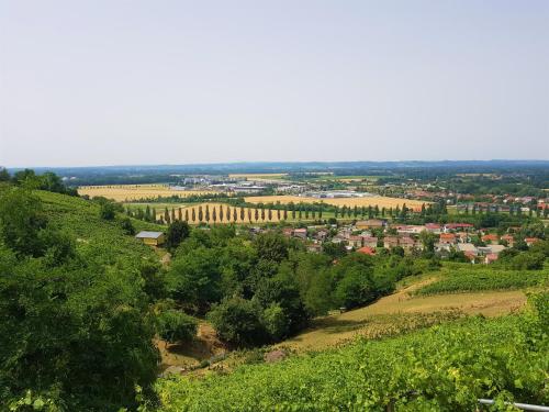 a view of a town from the top of a hill at Fado Apartments Lendava in Lendava