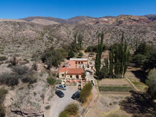 an aerial view of a house in the desert at Hosteria la granja in Huacalera
