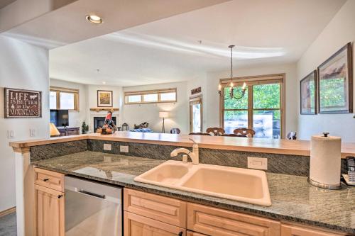 a kitchen with a sink and a counter top at Breckenridge Condo with Hot Tub Less Than 1 Mi to Ski Lifts in Breckenridge