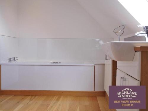 a bathroom with a sink and a white sink at Highland Stays - Ben View Double Rooms in Fort William