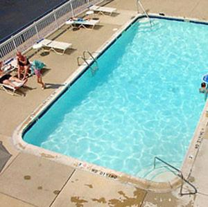 an overhead view of a large blue swimming pool at Americas Best Value Inn Canton in Canton