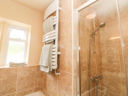 Ένα μπάνιο στο Underbank Hall Cottage