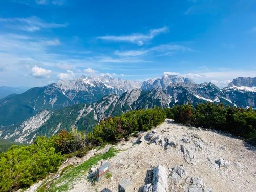 a view of the mountains from the top of a mountain at Guest House Vila Moj Mir in Rateče