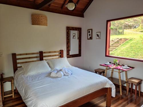 Katil atau katil-katil dalam bilik di Canto da Colina Lumiar