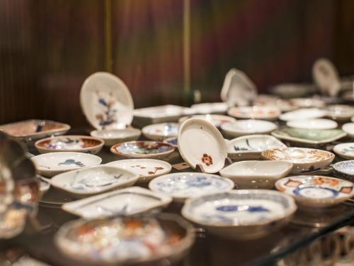 a group of plates and bowls on a table at Portom International Hokkaido in Chitose