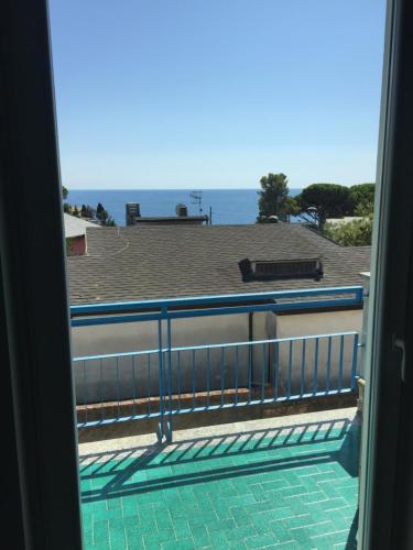 a view of the ocean from a balcony at La Dimora di Clara in Monterosso al Mare