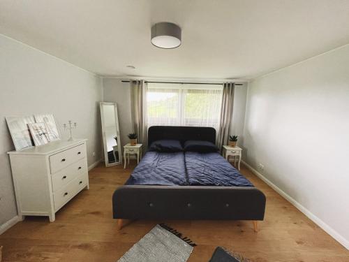 Postel nebo postele na pokoji v ubytování Apartamenty Pod Kątami