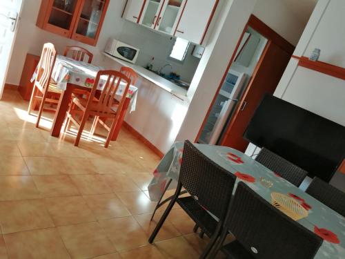TV a/nebo společenská místnost v ubytování Coqueto apartamento