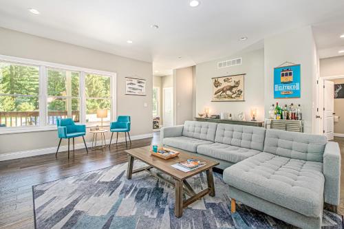 a living room with a couch and a table at Friendly Farms in Lakeside