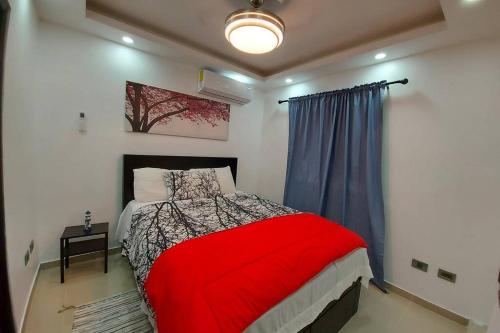 Giường trong phòng chung tại 4to nivel 2 habitaciones 2 baños Alma Rosa I