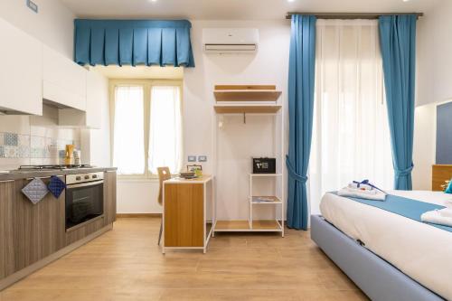 Kuchyň nebo kuchyňský kout v ubytování Le Meraviglie Di Napoli