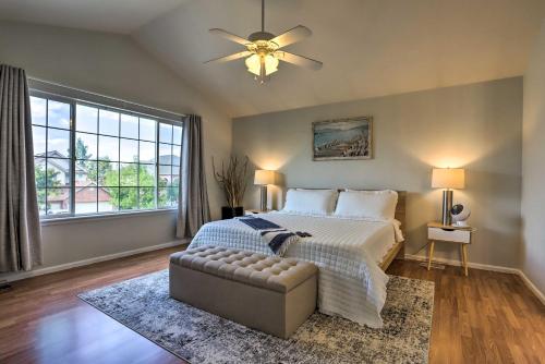 a bedroom with a bed and a ceiling fan at Spacious Thornton Home 15 Mi to Downtown Denver! in Thornton