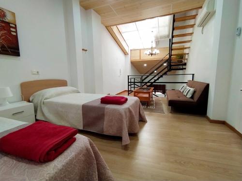 En eller flere senge i et værelse på Casa Ramon y Cajal Alcañiz