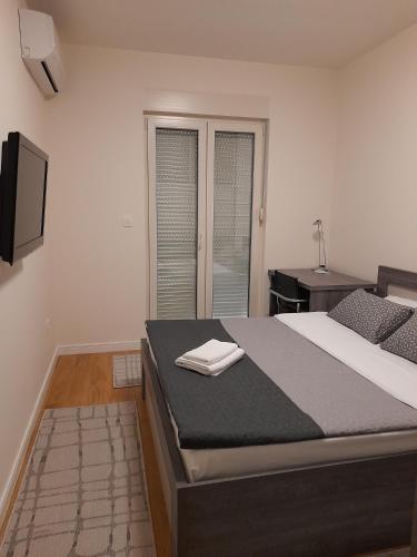TV a/nebo společenská místnost v ubytování Apartment Diamond