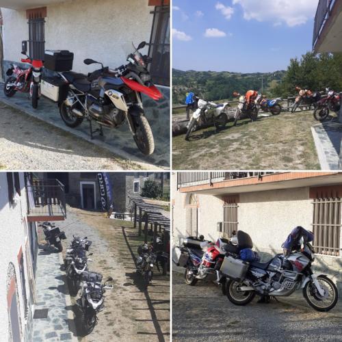 a group of motorcycles parked outside of a building at Cascina Merlo Country House in Pareto