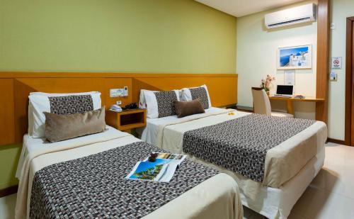 Hotel Santoriniにあるベッド