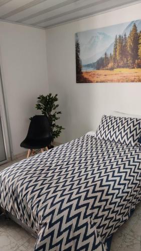 Cama o camas de una habitación en CASA AVILA - Apartamento amoblado 2 - Villa Alsacia