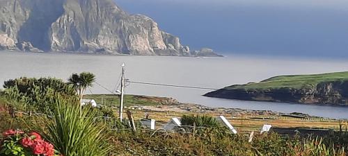 a view of a body of water with a mountain at Creevagh (Room Only) in Keel