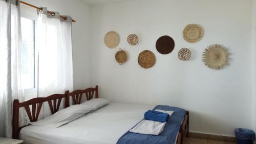 Postel nebo postele na pokoji v ubytování Casa Greca