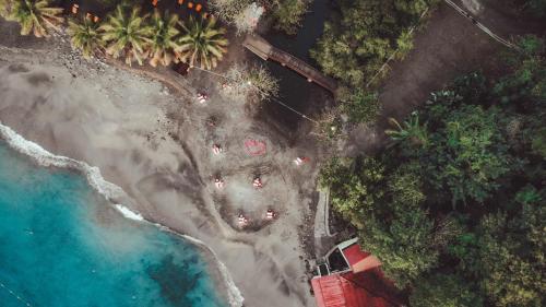 an aerial view of the beach and the ocean at Ti Kaye Resort & Spa in Anse La Raye