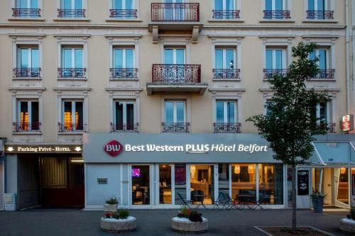 a building with a best western plus hotel exterior at Best Western Plus Hôtel Belfort Centre Gare in Belfort