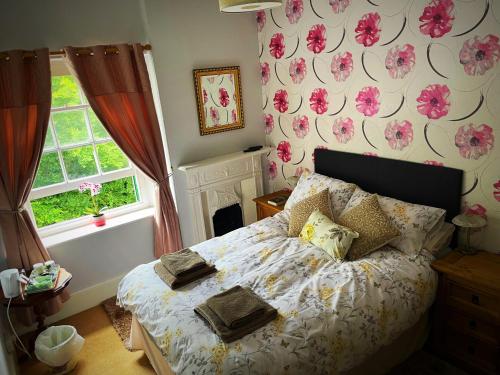 Katil atau katil-katil dalam bilik di the Dartmoor bnb