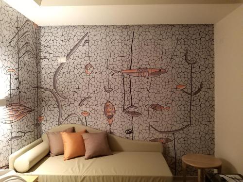 Katil atau katil-katil dalam bilik di Hotel Miramare