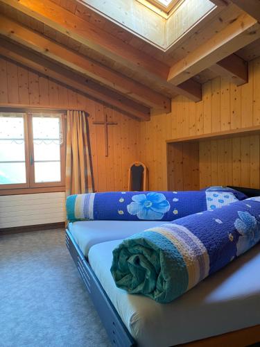 Llit o llits en una habitació de Ferienwohnung Stalden