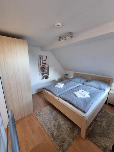 Postel nebo postele na pokoji v ubytování Stadthaus Nr. 16