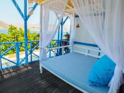 Кровать или кровати в номере Aphrodite Hotel Bozburun