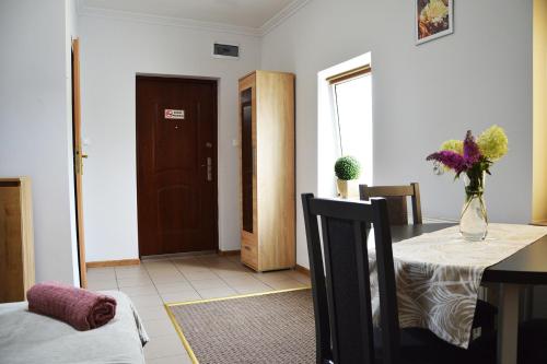 Postel nebo postele na pokoji v ubytování Apartament Adabet