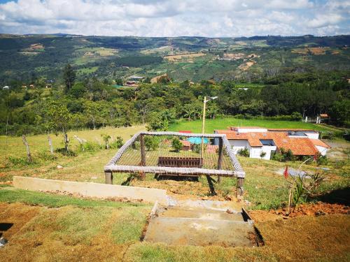 an aerial view of a playground on a hill at Villa Namaste - Cabaña Excélsior in Curití